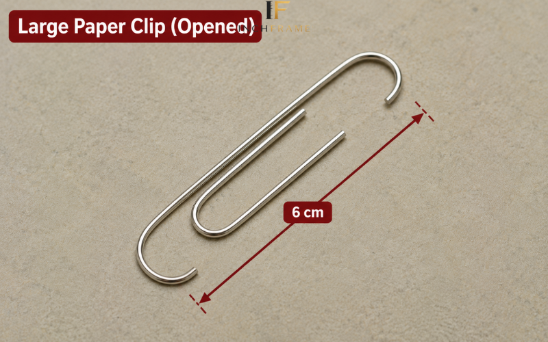 Large paper clip measuring 6 cm